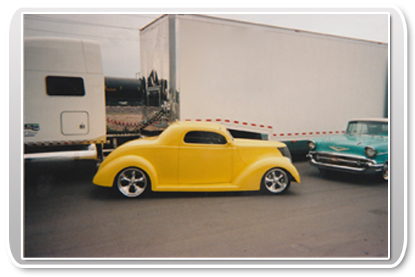 Classic Car with Enclosed Car Transporter