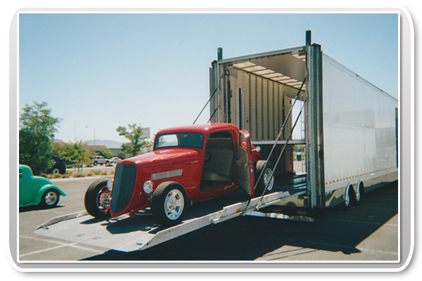 Classic Car in Enclosed Car Transporter